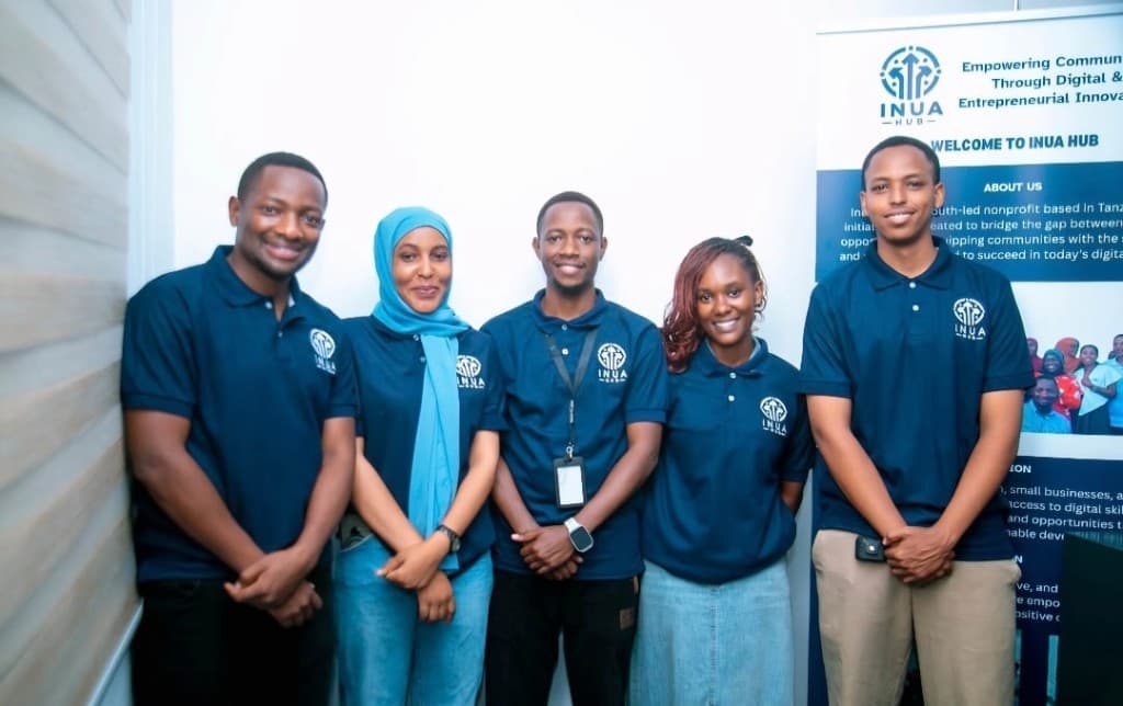 The Inua Hub team in matching navy shirts